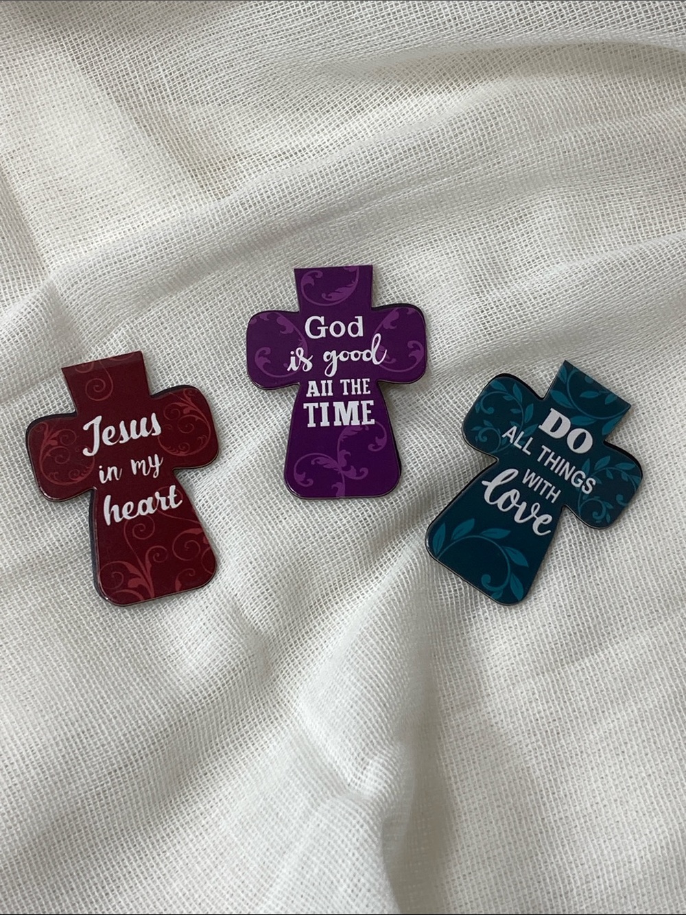 Magnetic cross shaped inspirational bookmarks.